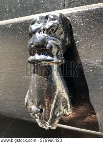 Old And Ancient Knocker In The City Of Ars-en-re