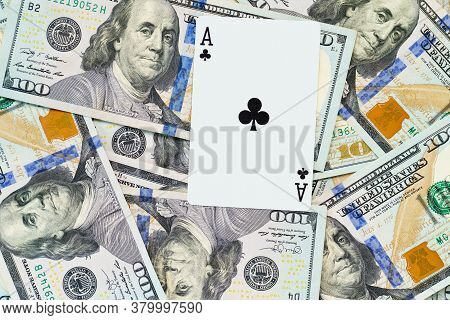 Playing Cards On Us Dollars Background. Close Up Of A Lot Of Banknotes Hundred Dollar Bills. America
