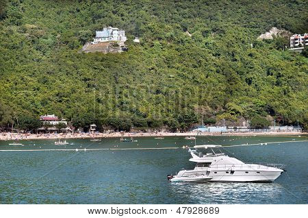 Boats And Swimmers At Deepwater Bay, Hong Kong Island