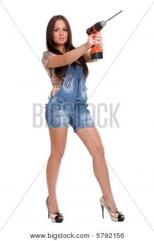 Young woman holding drill