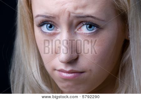 Closeup portrait of sad woman