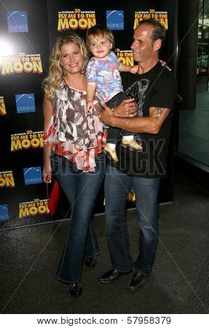 Kristy Swanson with Lloyd Eisler and their son Magnus  at the Los Angeles Premiere of 