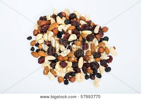 mixed nuts and dried fruits isolated on white background