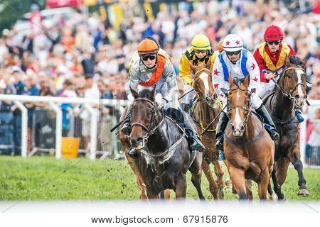 Jockeys Into Last Curve At The Nationaldags Galoppen In Gardet