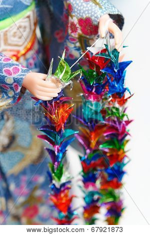 Making Senbazuru (a Thousand Origami Cranes)