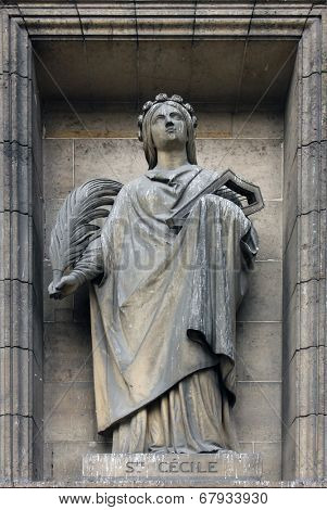 PARIS,FRANCE - NOV 09,2012: Saint Cecilia, architectural details of Eglise de la Madeleine. Madeleine Church was designed in its present form as a temple to the glory of Napoleon's army.