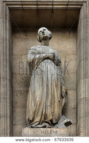 PARIS,FRANCE - NOV 09,2012: Saint Helena, architectural details of Eglise de la Madeleine. Madeleine Church was designed in its present form as a temple to the glory of Napoleon's army.