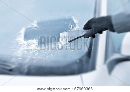 Winter driving - Scraping ice from a windshield