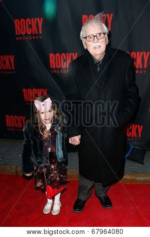 NEW YORK-MAR 13: Writer Thomas Meehan (R) and granddaughter Emma attend the 'Rocky' Broadway opening night at the Winter Garden Theatre on March 13, 2014 in New York City.