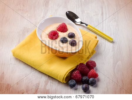 orange sorbetto with blueberry and raspberry