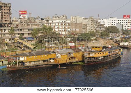 Sadarghat boat terminal and riverside residential area, Dhaka, Bangladesh.