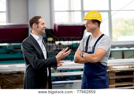 young boss and worker in conversation