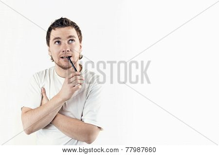 Portrait of handsome young thoughtful man isolated over white background