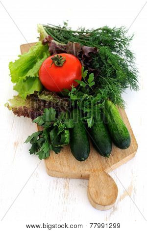 Green Cucumbers, Tomato And Fresh Herbs