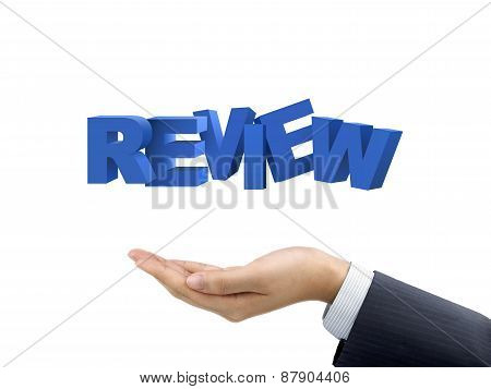 Businessman's Hand Holding Review Words