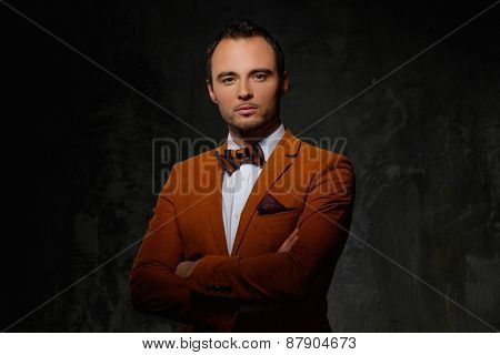 Sharp dressed fashionist wearing jacket and bow tie