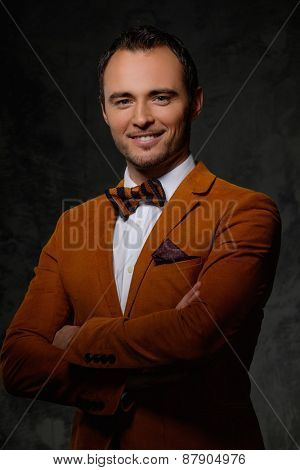 Sharp dressed fashionist wearing jacket and bow tie