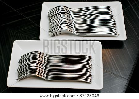 Many Forks Isolated On A White Dish