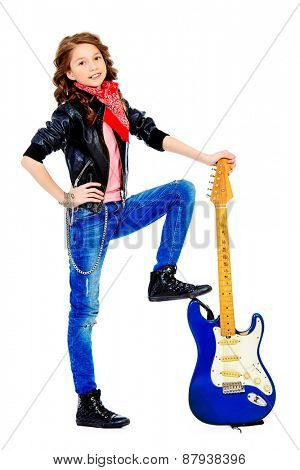 Cute teen girl posing with her electric guitar. Isolated over white. 