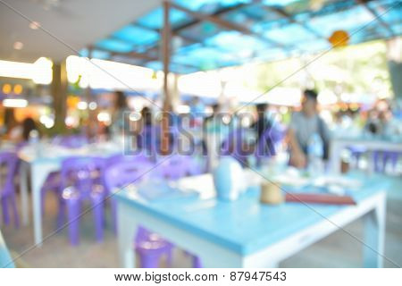 Blur Or Defocus Image Of Outdoor Restaurant With Garden In Background