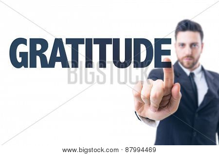Business man pointing the text: Gratitude