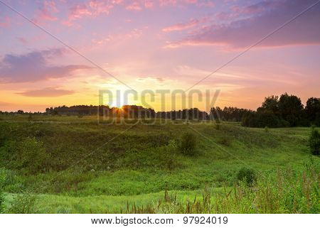 green meadow ravine sunset.