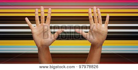 gesture, people and body parts concept - african woman two hands showing palms or making high five over blue sky and clouds background