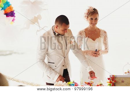 Beautiful  Gorgeous Blonde Bride  And Stylish Groom, Hawai  Colorful Sand Ceremony On Cyprus