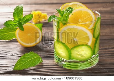 Cool Drink With Lemon And Mint On A Wooden Background