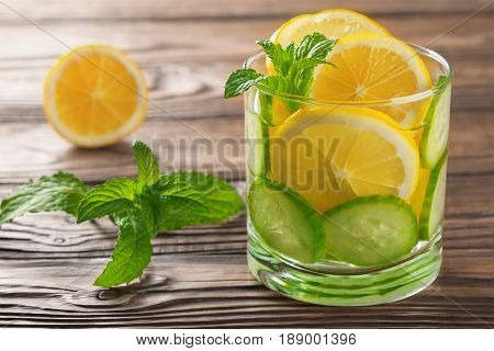 Cool Drink With Lemon And Mint On A Wooden Background