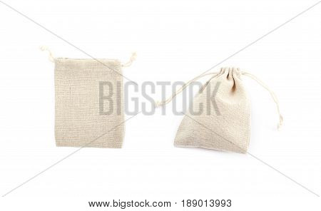 Cloth gift bag with a lace stringing isolated over the white background, set of two different foreshortenings