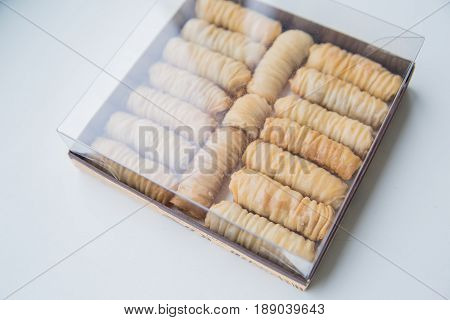 Baklava is a Middle-Eastern dessert. It is a rich, sweet pastry made of layers of filo filled with chopped nuts