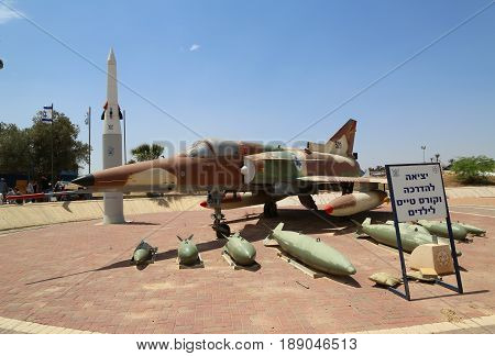HATZERIM, ISRAEL - MAY 2, 2017: The Israel Aircraft Industries Kfir with its typical weapon loadout on display at the Israeli Air Force Museum.
