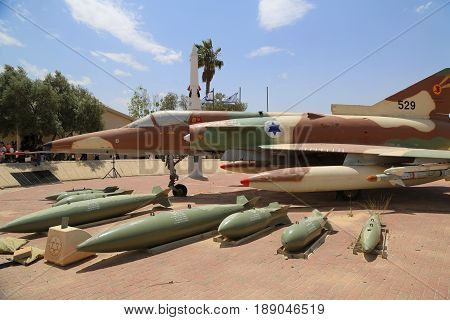 HATZERIM, ISRAEL - MAY 2, 2017: The Israel Aircraft Industries Kfir with its typical weapon loadout on display at the Israeli Air Force Museum.