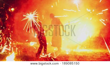 Colorful fireworks show at night - blurred, telephoto