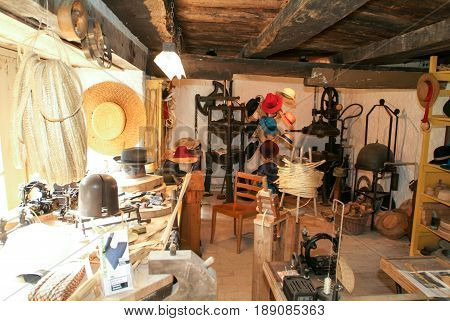 Ballenberg Switzerland - 23 September 2006: Old tailoring of hats at Ballenberg a Swiss open-air museum in Brienz Switzerland