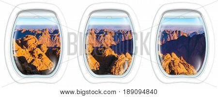 Three porthole frame windows on the holy summit of Mount Sinai, Aka Jebel Musa, 2285 meters, at sunrise, Sinai Peninsula in Egypt. Spirituality, religion and history concept.