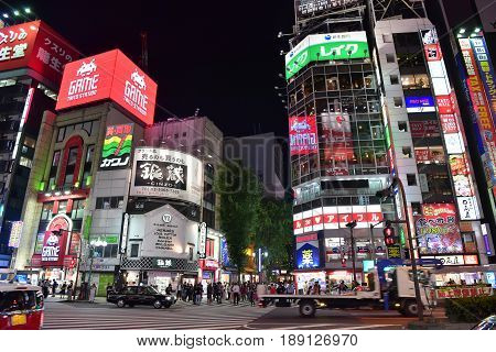 SHINJUKU - MAY 28: Japanese and tourists walking shopping at Shinjuku (large entertainment business and shopping area around Shinjuku Station) on May 28 2017 at Shinjuku in Tokyo Japan.