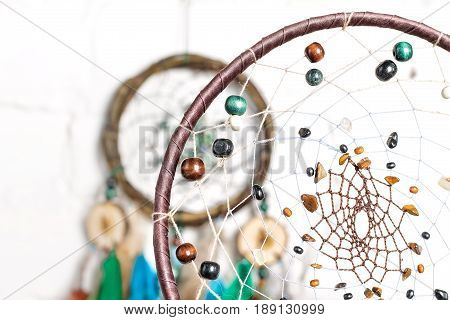 a Native american dream catcher moved by wind