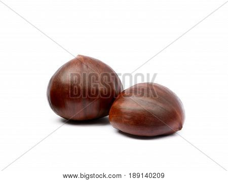 Fresh autumn chestnuts isolated on white background