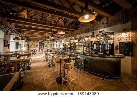 Modern Caffe Interior With Long Bar Counter