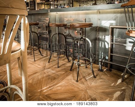 Bar Stools In Caffe Interior, Wooden Floor In Restaurant