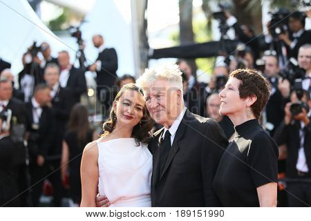 Emily Stofle, director David Lynch and producer Sabrina S. Sutherland  attend the Closing Ceremony during the 70th annual Cannes  Festival at Palais des Festivals on May 28, 2017 in Cannes, France.