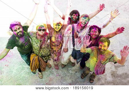 RISHIKESH, INDIA - MARCH 17, 2014 - people celebrating holi