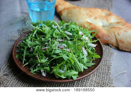 Healthy food delivery. Fitness food. Weight loss nutrition diet. Eat right concept, healthy food, clean food. Fresh salad from lettuce leaves and bread.