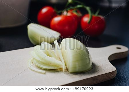 Chopped Onion On A Wooden Chopping Board