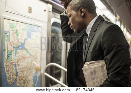 Businessman in full suit in New York subway metro