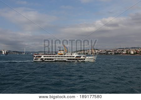 ISTANBUL TURKEY - MAY 27 2017: Sehir Hatlari ferry in Bosphorus Strait. Sehir Hatlari was established in 1844 and now carry 150000 passengers a day.