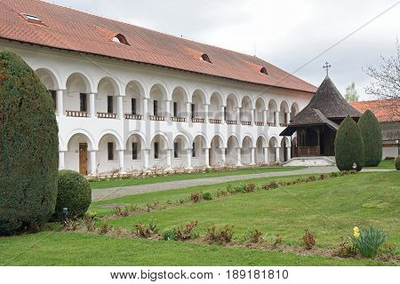 arched colonade of Sambata de Sus monastery in Transylvania Romania