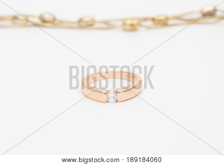 gold diamond ring engagement wedding isolated on white background